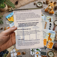 En hånd holder den danske historie og mission til safarieventyret